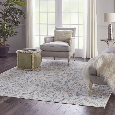 Elegant Ivory and Blue Damask 7' x 10' Synthetic Area Rug