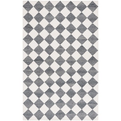 Ebony EBN120 Handmade Tufted Rug - Safavieh