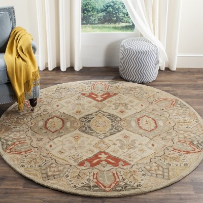 Antiquity Handmade Oval Red Wool Area Rug
