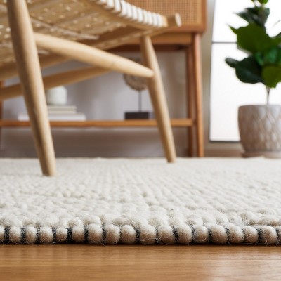 Handmade Black and Ivory Geometric Wool Rug, 2' 3" x 8'