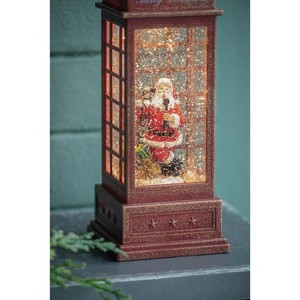 YOOCOZZ Dreamy Christmas Ornaments Decoration - 4x4x10"H Xmas Lighted Water Spinning Phone Booth, With Santa On Phone, 3*AA Batteries Required - 1 of 4