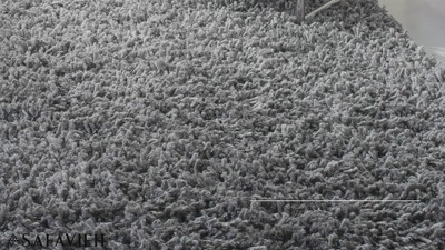 Ivory Hand-Tufted Shag Sheepskin 8' x 10' Area Rug