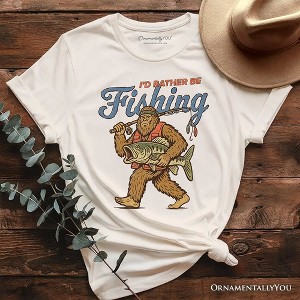 I’d Rather Be Fishing Bigfoot T-Shirt, Funny Sasquatch Fishermen Tee Natural M - 1 of 4