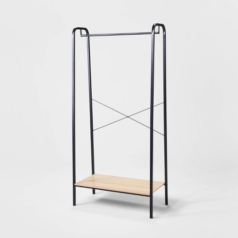 Metal clothes rail online with shelves