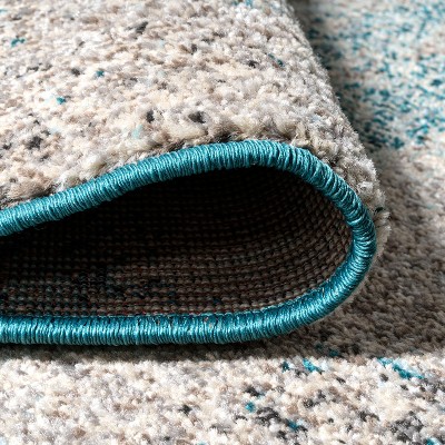Cream and Turquoise Abstract Synthetic Area Rug