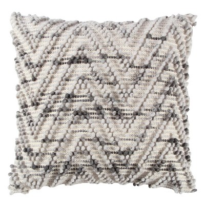 grey and beige pillows