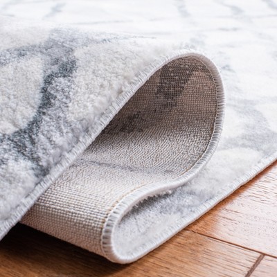 Ivory and Grey 4' x 6' Hand-Knotted Synthetic Area Rug