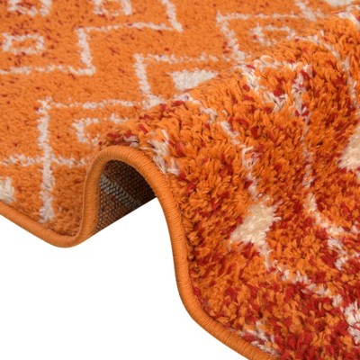 6' x 9' Orange and Red Synthetic Trellis Area Rug