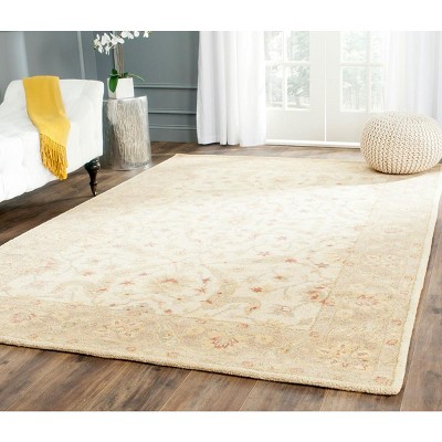 Hand-Tufted Elegance Round Ivory & Brown Wool Rug, 3' x 5'