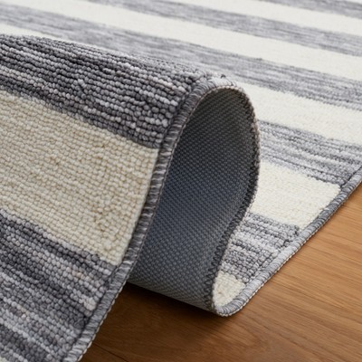 Dark Grey and Ivory Striped 6' x 9' Synthetic Area Rug