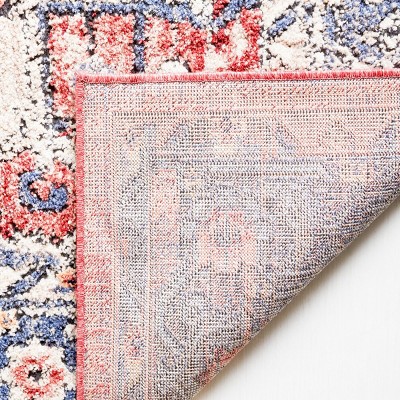 Luna 4'5" x 6'5" Blue and Rust Synthetic Area Rug