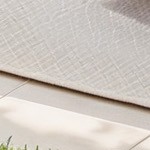 blue cushion/brown wicker