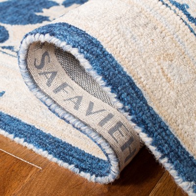 Navy and Ivory Tufted Handmade Wool 8' x 10' Area Rug