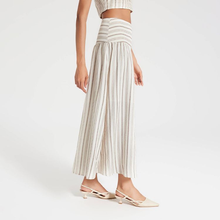 Ankle length skirt with vertical beige and white stripes and a wide waistband.