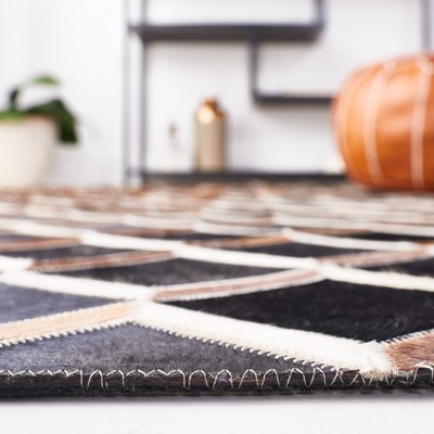 Handmade Black Geometric Wool and Cowhide Rug, 4' x 6'