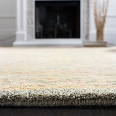 Handmade Blue and Ivory Tufted Wool Area Rug