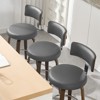Bekrvio 26" Faux Leather Swivel Bar Stools Set of 1/2/3/4,Mid Century Modern Counter Chairs with Wood Legs and Curved Back for Kitchen Island - 3 of 4