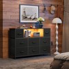 8-Drawer Fabric Dresser with Charging Station and LED Lights, TV Stand for 55-Inch - 2 of 4