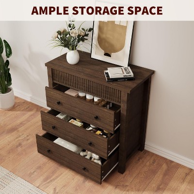 Top of dresser with decor items and open storage space