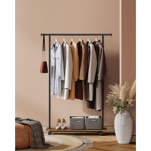 SONGMICS Clothes Rack with Wheels, Clothing Rack for Hanging Clothes, 38.8 Inches Metal Garment Rack with Shelf, Rustic Brown and Ink Black - 1 of 4