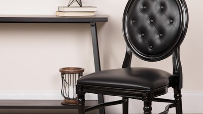 White Vinyl Upholstered Side Chair with Round Back and Resin Frame