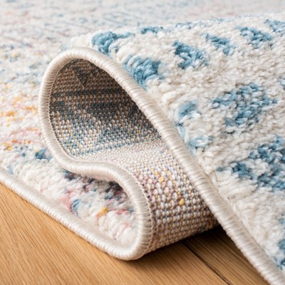 Ivory and Terracotta Round Synthetic Geometric Area Rug