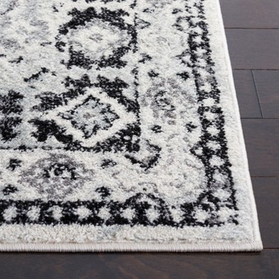 Ivory Round Stain-Resistant Synthetic Area Rug