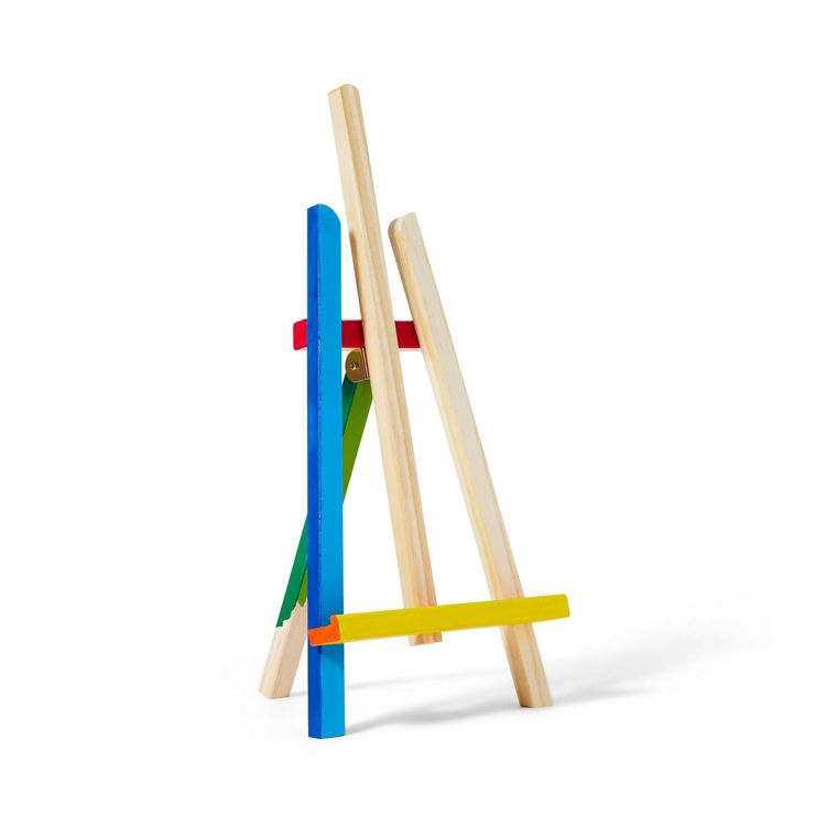 A wooden easel with colorful accents in blue, red, green, and yellow.