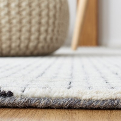 Ivory Round Handmade Tufted Wool Abstract Rug