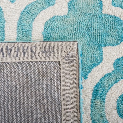 Turquoise and Ivory Hand-Tufted Wool 4' x 6' Area Rug