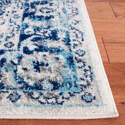 Ivory and Blue Hand-Knotted Round Synthetic Area Rug