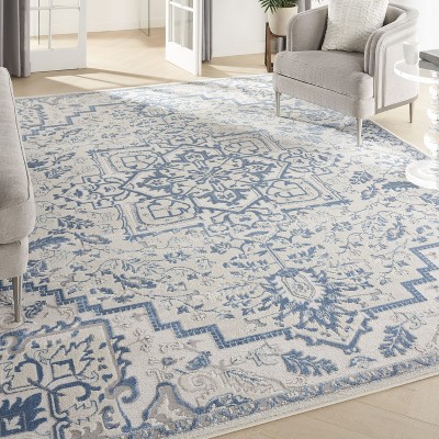 Ivory Blue Floral Synthetic Rectangular 9' x 12' Area Rug