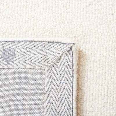 Ivory Elegance Hand-Tufted Wool Rectangular Rug