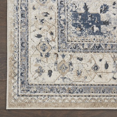 Ivory and Blue Geometric Floral Synthetic Area Rug
