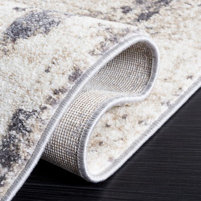 Ivory and Gray Synthetic Rectangular Area Rug, 5'3" x 7'6"