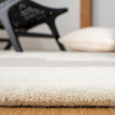 Ivory Elegance 8' x 10' Handmade Tufted Wool Rectangle Area Rug