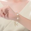 Guili White and Gold Sterling Silver Bracelet Adorned with Genuine Freshwater Pearls and Cubic Zirconia Accents for an Elegant and Feminine Touch. - 2 of 3