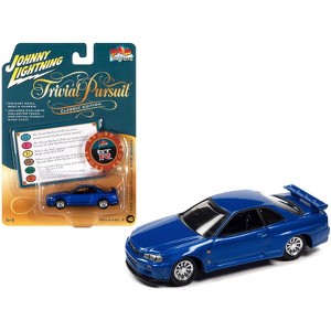 1999 Nissan Skyline GT-R RHD Blue Met. w/Poker Chip Collector's Token and Game Card 1/64 Diecast Model Car by Johnny Lightning - 1 of 3