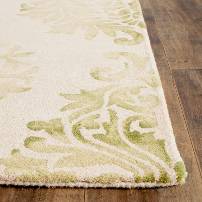 Beige and Green Hand-Tufted Wool 4' x 6' Area Rug