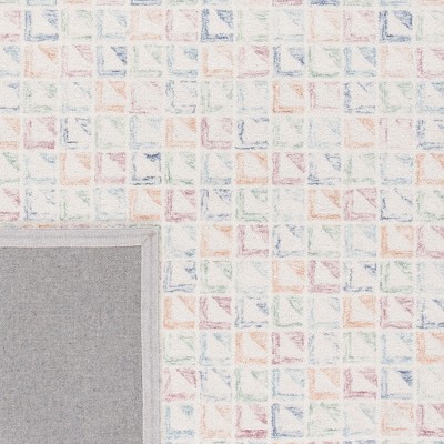 Ivory Coast Chic Hand-Tufted Wool Rectangular Rug