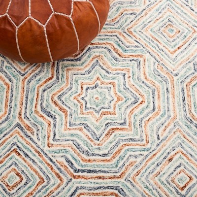 Capri Blue and Rust Hand-Tufted Wool Area Rug 6' x 9'