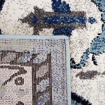 Blue and Ivory Synthetic Persian Area Rug, 5'3" x 7'6"