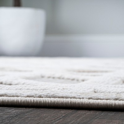 Ivory Geometric 4' x 6' Handmade Synthetic Indoor/Outdoor Rug