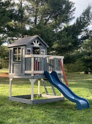 Target playhouse store with slide