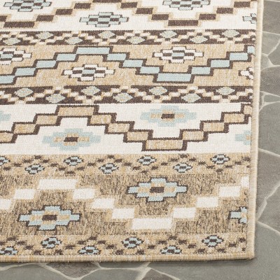 Veranda Blue and Brown Floral Synthetic Area Rug