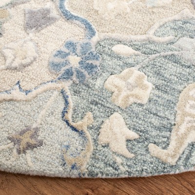Hand-Tufted Ivory and Red Round Wool Area Rug