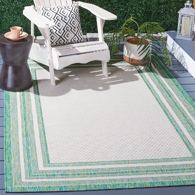Ivory and Green Reversible Synthetic Indoor/Outdoor Area Rug