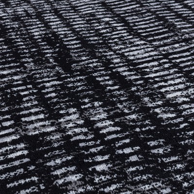 Black and Ivory Geometric Polypropylene Area Rug 2' x 7'