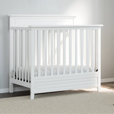 White 4-in-1 Convertible Mini Crib with Mattress