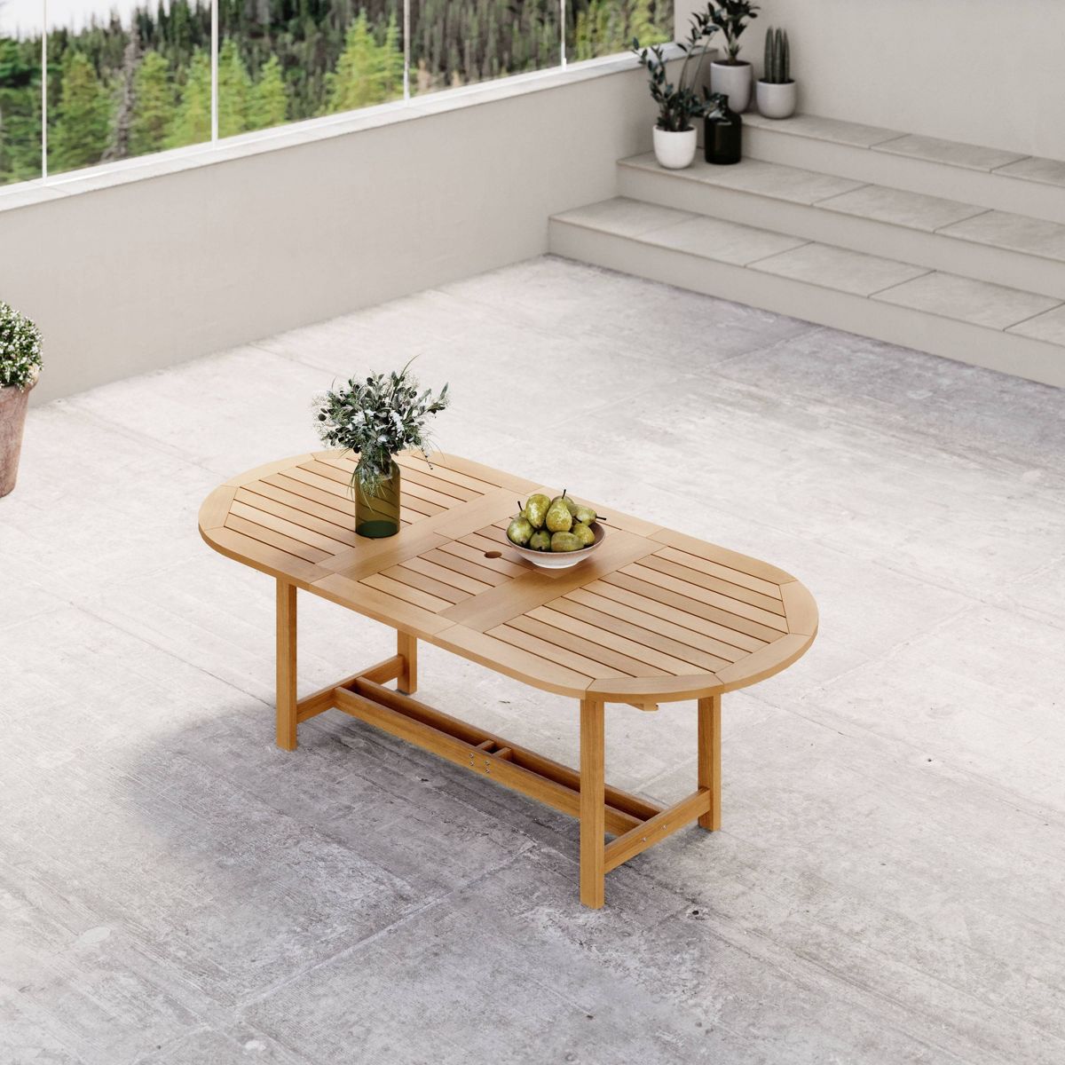 Teak-finish oval extendable patio dining table with slatted top
